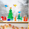 Weihnachts-Fensterbild Waldtiere und Tannenbäume aus Bastelset als Deko am Fenster im Winter
