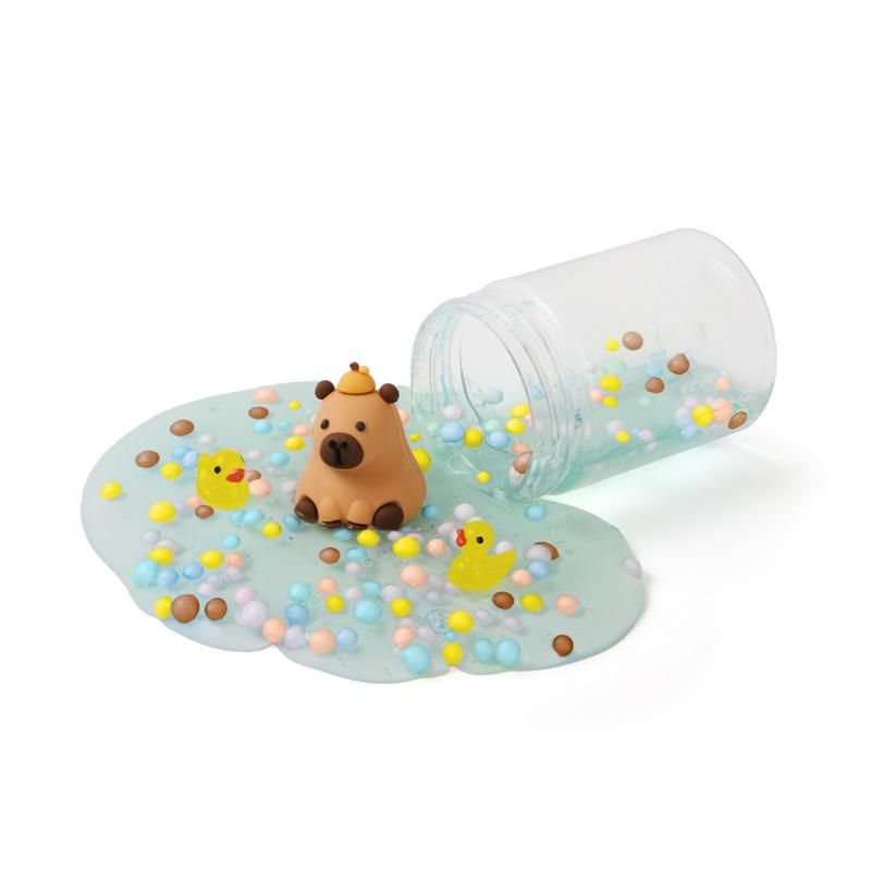 Dehnbarer Slime mit Capybara Figur und Entendekoration