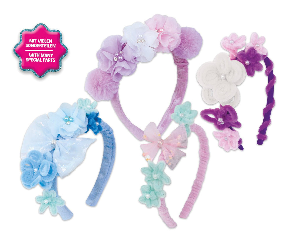 Satinbänder und Accessoires aus dem Set in Nahaufnahme
