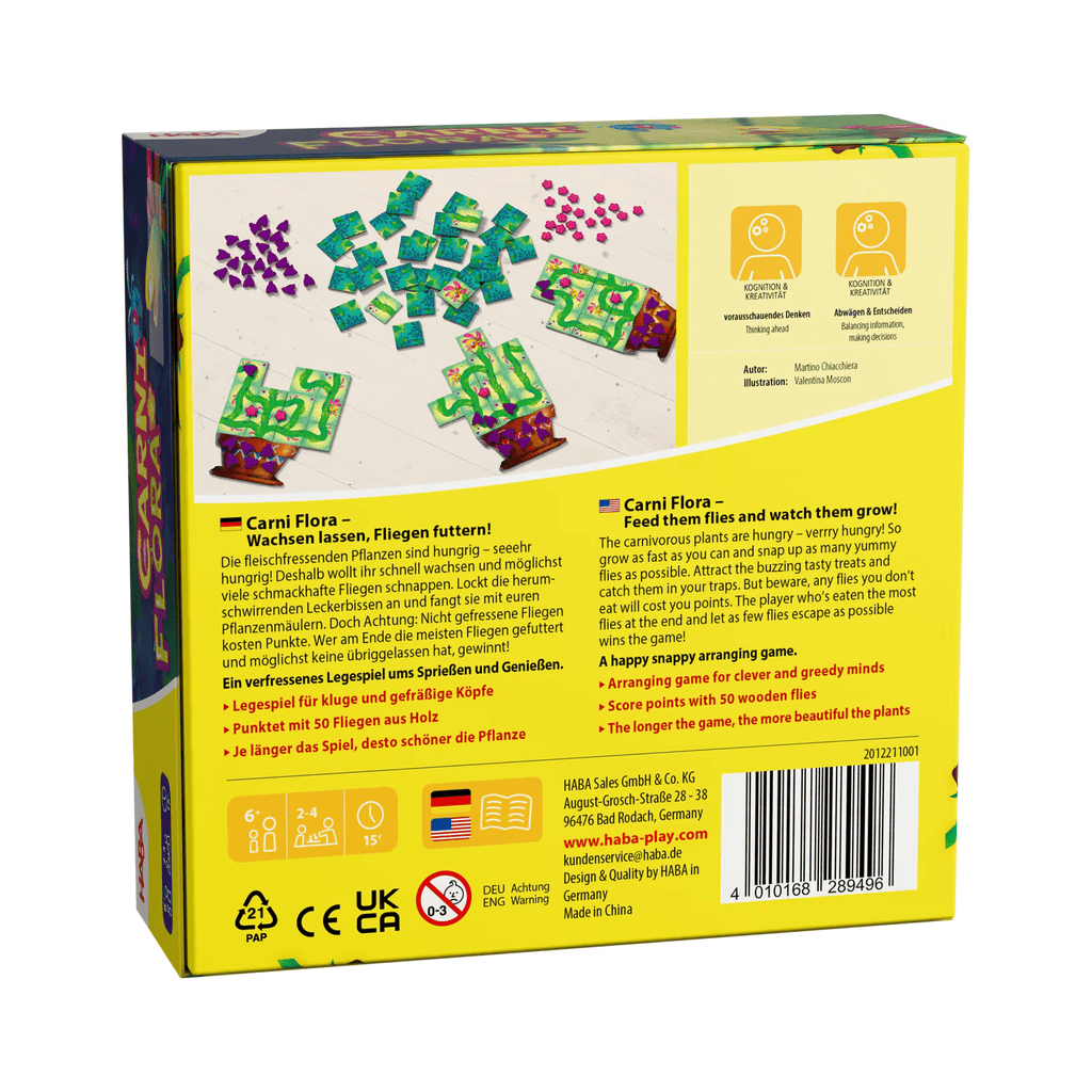 Spielende Kinder mit HABA Carni Flora auf Holztisch