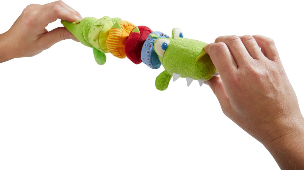 HABA Ratterfigur Kroko ab 6 – vibrierendes Babyspielzeug zum Ziehen