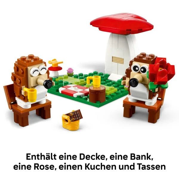 Picknick-LEGO-Set mit Igeln, Decke, Tassen, Kuchen und Schmetterling
