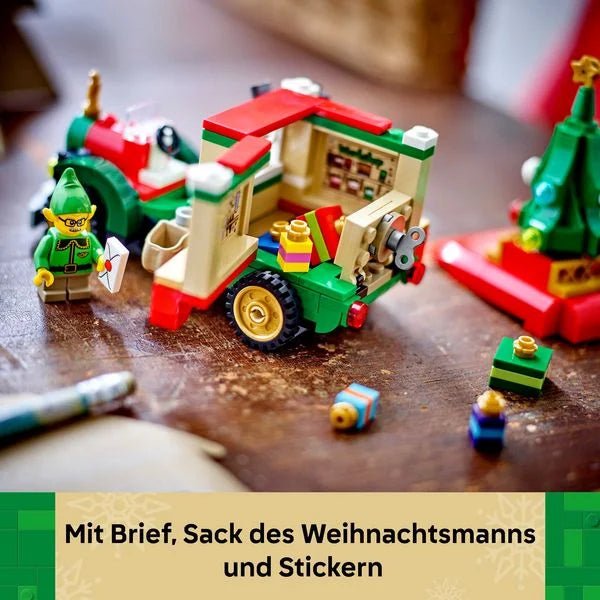 Festlicher LEGO Lieferwagen mit Elf am Steuer und Weihnachtselementen
