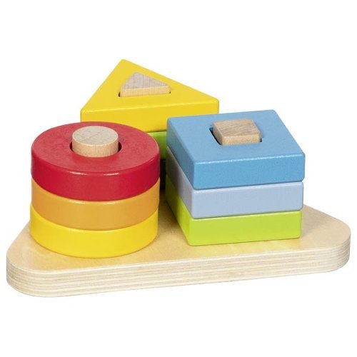 Sortierspiel aus Holz mit bunten Formen auf Holzplatte
