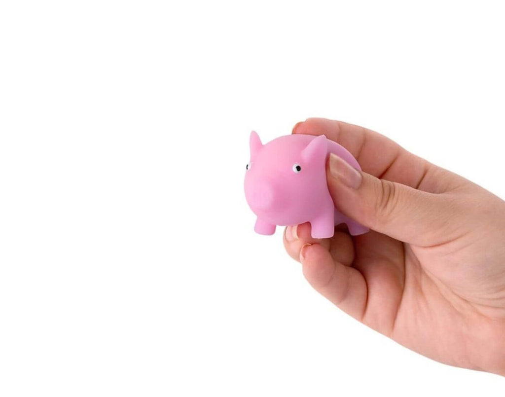 Kleines rosa Anti Stress Schwein aus weichem Material zum Kneten und Entspannen, ideal als Glücksbringer für unterwegs
