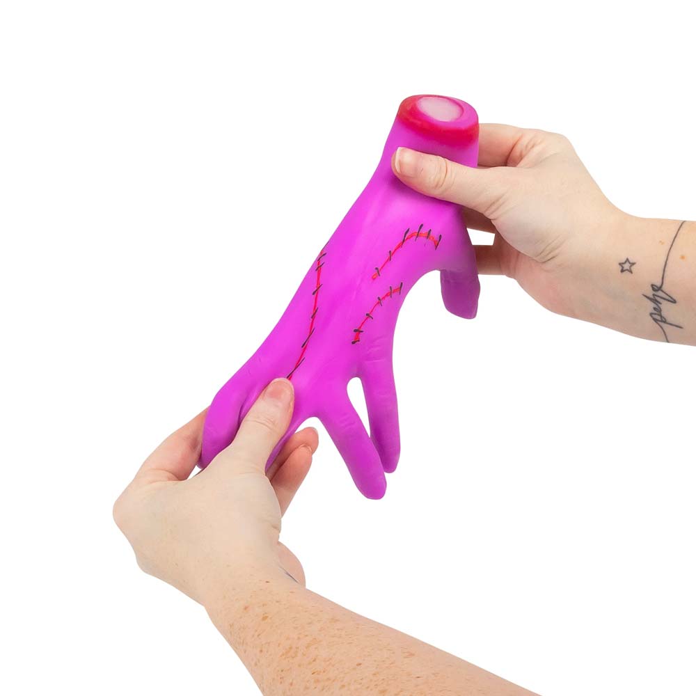 Stretchy Monsterhand mit Sandfüllung und leuchtenden Farben
